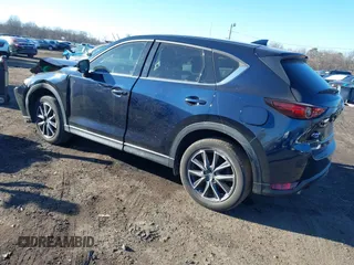2017 Mazda CX-5 Grand Touring with VIN JM3KFBDL0H0104806, listed as a IAAI auction lot 41621964 with 60,728 mi miles. Bid and sale history available at carsss.com. Image 3.