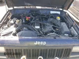 1996 Jeep Cherokee Country with VIN 1J4FT78S5TL148433, listed as a IAAI auction lot 41722054 with 276,612 mi miles and . Bid and sale history available at DreamBid. Image 10.