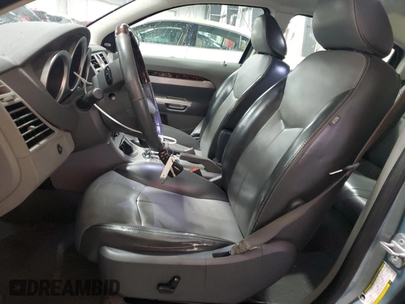 2008 Chrysler Sebring Limited с VIN 1C3LC66K28N296514, выставлен на аукционе Copart как лот 62515775 с пробегом 125 631 миль миль и Списание • Salvage title. История ставок и продаж доступна на DreamBid. Изображение 7.