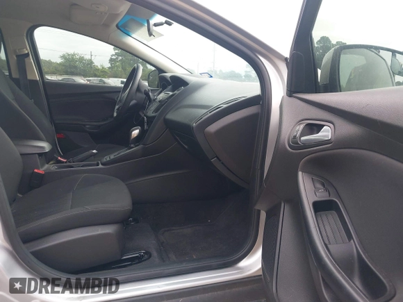 2016 Ford Focus SE with VIN 1FADP3F20GL325141, listed as a IAAI auction lot 42472407 with 103,799 mi miles and . Bid and sale history available at DreamBid. Image 5.