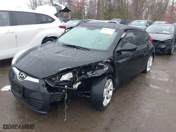 2012 Hyundai Veloster w/Black Int with VIN KMHTC6ADXCU024923, listed as a IAAI auction lot 41556793 with 101,923 mi miles. Bid and sale history available at carsss.com. Image 17.