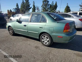 2003 Hyundai Accent GL with VIN KMHCG45C63U430403, listed as a Copart auction lot 86430724 with 74,200 mi miles and Salvage Title. Bid and sale history available at carsss.com. Image 2.