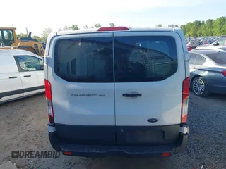 2018 Ford Transit with VIN 1FTYE1YM8JKB52082, listed as a IAAI auction lot 42098033 with 243,181 mi miles. Bid and sale history available at carsss.com. Image 16.