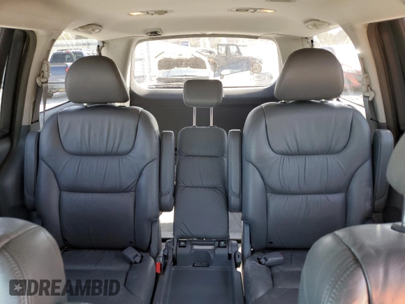 2005 Honda Odyssey EX-L with VIN 5FNRL38675B411705, listed as a Copart auction lot 50131575 with 142,480 mi miles and Salvage Title. Bid and sale history available at carsss.com. Image 10.