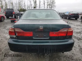 2000 Honda Accord LX z VIN 1HGCG5648YA154043, wystawiony jako Copart lot #51854515 z przebiegiem 176 150 mil mil oraz Szkoda całkowita • Salvage title. Historia ofert i sprzedaży dostępna na DreamBid. Obrazek 6.