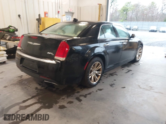 2015 Chrysler 300 300C with VIN 2C3CCAEG6FH779641, listed as a IAAI auction lot 41971178 with 158,354 mi miles. Bid and sale history available at carsss.com. Image 4.