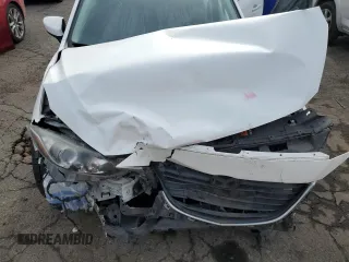 2016 Mazda 3 i Touring z VIN JM1BM1W70G1299548, wystawiony jako Copart lot #52575085 z przebiegiem 136 964 mil mil oraz Szkoda całkowita • Salvage title. Historia ofert i sprzedaży dostępna na DreamBid. Obrazek 11.