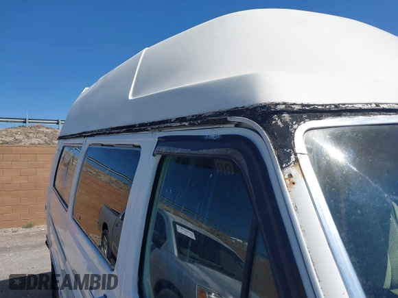 1985 Ford Econoline Cargo with VIN 1FBHS31L3FHA83624, listed as a IAAI auction lot 41987555 with 2,242 mi miles and . Bid and sale history available at DreamBid. Image 6.