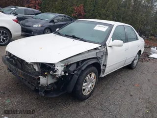 2000 Toyota Camry CE with VIN 4T1BG22K2YU976361, listed as a IAAI auction lot 38059387 with 153,541 mi miles. Bid and sale history available at carsss.com. Image 2.