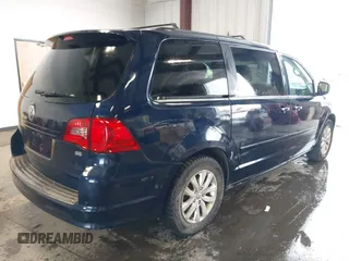 2014 Volkswagen Routan SE with VIN 2C4RVABG2ER134482, listed as a IAAI auction lot 41533277 with 118,193 mi miles and . Bid and sale history available at DreamBid. Image 4.