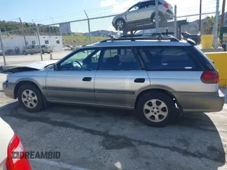 1999 Subaru Legacy Outback z VIN 4S3BG6850X6621723, wystawiony jako IAAI lot #41932992 z przebiegiem 283 200 mil mil oraz . Historia ofert i sprzedaży dostępna na DreamBid. Obrazek 14.