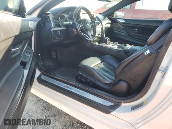 2014 BMW M6 z VIN WBSLX9C51ED160143, wystawiony jako Copart lot #50762185 z przebiegiem 91 718 mil mil oraz Szkody całkowita. Historia ofert i sprzedaży dostępna na DreamBid. Obrazek 8.