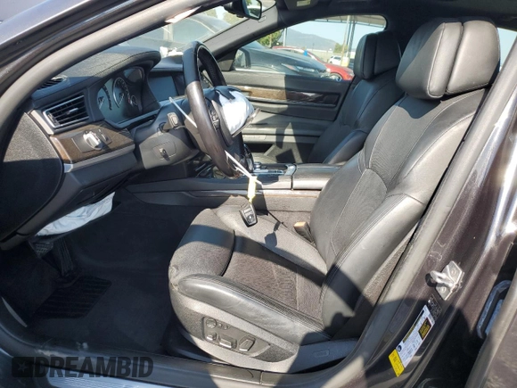 2011 BMW 7 Series 750i with VIN WBAKA8C58BCY37346, listed as a Copart auction lot 65017655 with 125,505 mi miles and Salvage title. Bid and sale history available at DreamBid. Image 7.