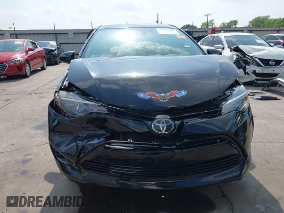 2019 Toyota Corolla L z VIN 5YFBURHE7KP905555, wystawiony jako IAAI lot #41943232 z przebiegiem 83 213 mil mil oraz . Historia ofert i sprzedaży dostępna na DreamBid. Obrazek 6.