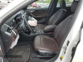 2021 BMW X1 xDrive28i z VIN WBXJG9C02M5S69998, wystawiony jako Copart lot #54782065 z przebiegiem 48 211 mil mil oraz Szkoda całkowita • Salvage title. Historia ofert i sprzedaży dostępna na DreamBid. Obrazek 7.