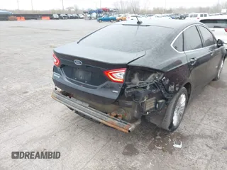 2016 Ford Fusion Energi SE Luxury with VIN 3FA6P0PU2GR322430, listed as a IAAI auction lot 42038508 with 114,980 mi miles. Bid and sale history available at carsss.com. Image 6.