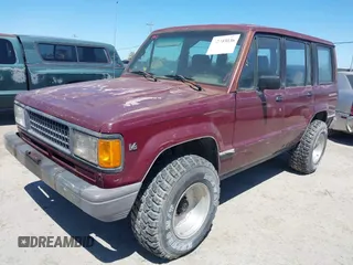 1991 Isuzu Trooper z VIN JACCH58R8M7904079, wystawiony jako IAAI lot #42303036 z przebiegiem 244 672 mil mil oraz . Historia ofert i sprzedaży dostępna na DreamBid. Obrazek 2.