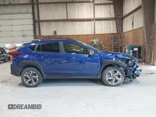 2024 Subaru Crosstrek Premium z VIN JF2GUADC3R8318644, wystawiony jako IAAI lot #42558586 z przebiegiem 33 648 mil mil oraz . Historia ofert i sprzedaży dostępna na DreamBid. Obrazek 13.