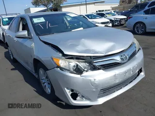 2012 Toyota Camry L z VIN 4T4BF1FKXCR244890, wystawiony jako IAAI lot #42489610 z przebiegiem 172 543 mil mil oraz . Historia ofert i sprzedaży dostępna na DreamBid. Obrazek 1.