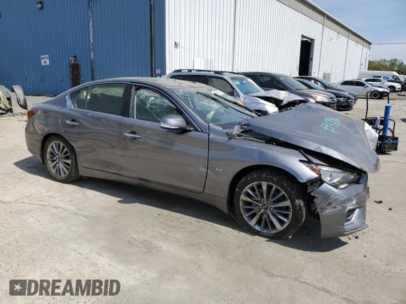 2019 Infiniti Q50 Luxe with VIN JN1EV7AR4KM558896, listed as a Copart auction lot 54249545 with 96,696 mi miles and Salvage title. Bid and sale history available at DreamBid. Image 4.