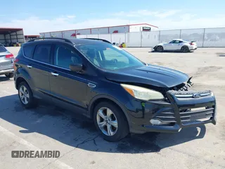 2015 Ford Escape SE with VIN 1FMCU9G9XFUC14744, listed as a IAAI auction lot 41967223 with 161,513 mi miles. Bid and sale history available at carsss.com. Image 1.