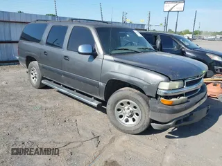 2001 Chevrolet Suburban LS z VIN 3GNEC16T21G163239, wystawiony jako IAAI lot #42037678 z przebiegiem 293 293 mil mil oraz . Historia ofert i sprzedaży dostępna na DreamBid. Obrazek 1.