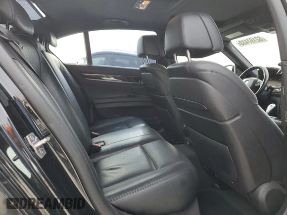 2015 BMW 7 Series 740i with VIN WBAYA6C50FD826727, listed as a Copart auction lot 82197433 with 241,799 mi miles and . Bid and sale history available at DreamBid. Image 10.