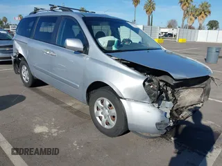2009 Kia Sedona LX with VIN KNDMB233696303422, listed as a IAAI auction lot 41685934 with 148,746 mi miles. Bid and sale history available at carsss.com. Image 1.
