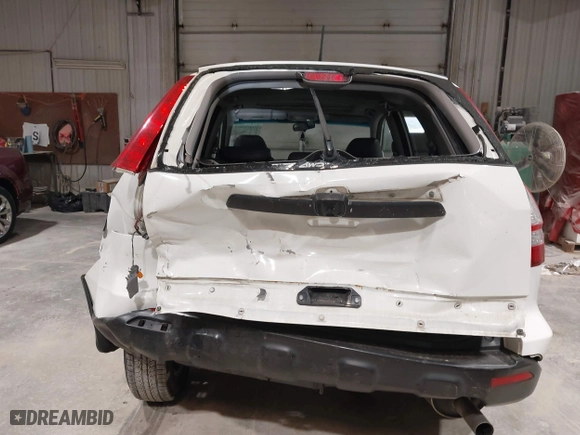 2009 Honda CR-V EX-L with VIN JHLRE48719C020466, listed as a IAAI auction lot 40452935 with 171,895 mi miles. Bid and sale history available at carsss.com. Image 6.