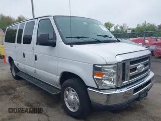 2014 Ford Econoline Passenger XL with VIN 1FBNE3BL4EDA97935, listed as a IAAI auction lot 42187031 with 228,696 mi miles. Bid and sale history available at carsss.com. Image 1.