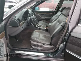 1997 BMW 7 Series 740il with VIN WBAGJ8329VDM00157, listed as a Copart auction lot 84459384 with 179,307 mi miles and Clean Title. Bid and sale history available at carsss.com. Image 7.