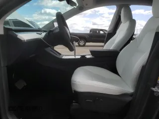 2023 Tesla Model Y Long Range z VIN 7SAYGDEE3PF916132, wystawiony jako Copart lot #51645625 z przebiegiem 28 238 mil mil oraz Szkoda całkowita • Salvage title. Historia ofert i sprzedaży dostępna na DreamBid. Obrazek 7.