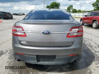 2014 Ford Taurus SEL z VIN 1FAHP2E80EG174910, wystawiony jako Copart lot #56070945 z przebiegiem 147 201 mil mil oraz Szkody całkowita. Historia ofert i sprzedaży dostępna na DreamBid. Obrazek 6.