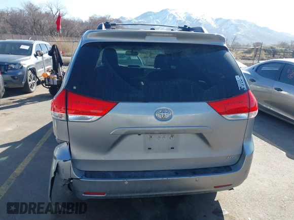 2011 Toyota Sienna XLE AAS with VIN 5TDYK3DC4BS014986, listed as a IAAI auction lot 41763681 with 169,619 mi miles. Bid and sale history available at carsss.com. Image 17.