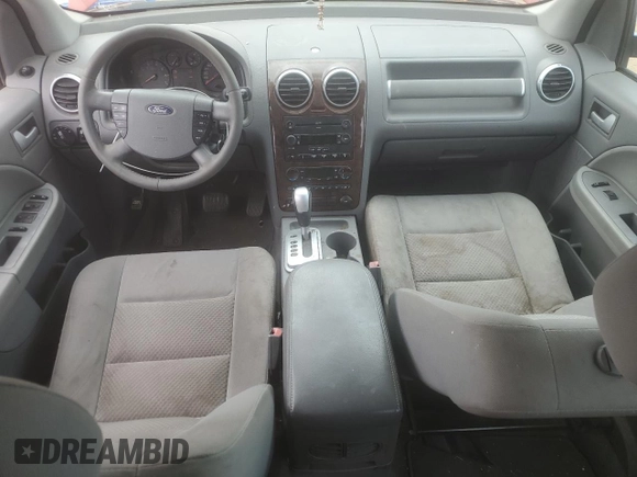 2007 Ford Freestyle SEL z VIN 1FMDK05137GA27655, wystawiony jako Copart lot #57710215 z przebiegiem 131 176 mil mil oraz Czysty tytuł • Clean title. Historia ofert i sprzedaży dostępna na DreamBid. Obrazek 8.