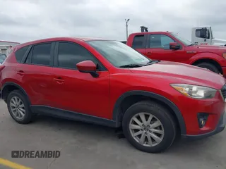 2015 Mazda CX-5 Touring with VIN JM3KE4CYXF0439953, listed as a IAAI auction lot 42124197 with 242,614 mi miles and . Bid and sale history available at DreamBid. Image 13.