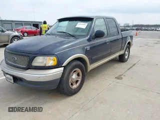 2001 Ford F-150 XLT with VIN 1FTRW07L01KE17954, listed as a IAAI auction lot 42040203 with Not provided miles and . Bid and sale history available at DreamBid. Image 2.