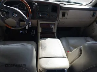 2004 Cadillac Escalade EXT z VIN 3GYEK62N94G191201, wystawiony jako IAAI lot #41747841 z przebiegiem 229 057 mil mil oraz . Historia ofert i sprzedaży dostępna na DreamBid. Obrazek 16.