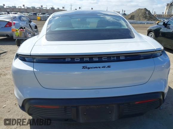 2021 Porsche Taycan 4S z VIN WP0AB2Y12MSA43873, wystawiony jako IAAI lot #41703233 z przebiegiem 24 452 mil mil oraz . Historia ofert i sprzedaży dostępna na DreamBid. Obrazek 16.