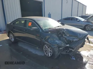 2014 Ford Taurus SE with VIN 1FAHP2D89EG149134, listed as a Copart auction lot 52363465 with 184,252 mi miles and Salvage Title. Bid and sale history available at carsss.com. Image 4.