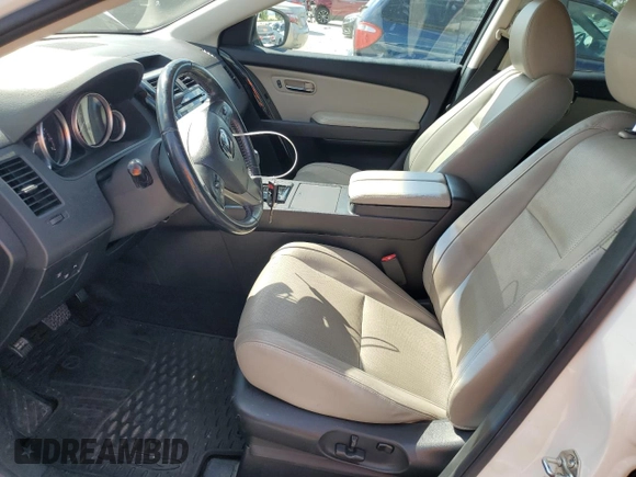 2015 Mazda CX-9 Touring z VIN JM3TB2CA6F0456866, wystawiony jako Copart lot #61475635 z przebiegiem 180 916 mil mil oraz Czysty tytuł • Clean title. Historia ofert i sprzedaży dostępna na DreamBid. Obrazek 7.