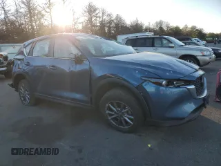 2023 Mazda CX-5 2.5 S with VIN JM3KFBAM5P0228761, listed as a Copart auction lot 42827995 with 0 mi miles and Salvage Title. Bid and sale history available at carsss.com. Image 4.
