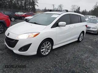 2015 Mazda Mazda5 Grand Touring with VIN JM1CW2DL6F0185594, listed as a IAAI auction lot 41470568 with 116,309 mi miles. Bid and sale history available at carsss.com. Image 17.