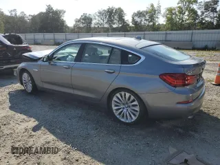 2014 BMW 5 Series GT 535i with VIN WBA5M2C58ED085437, listed as a Copart auction lot 68614494 with 91,917 mi miles and Salvage Title. Bid and sale history available at carsss.com. Image 2.