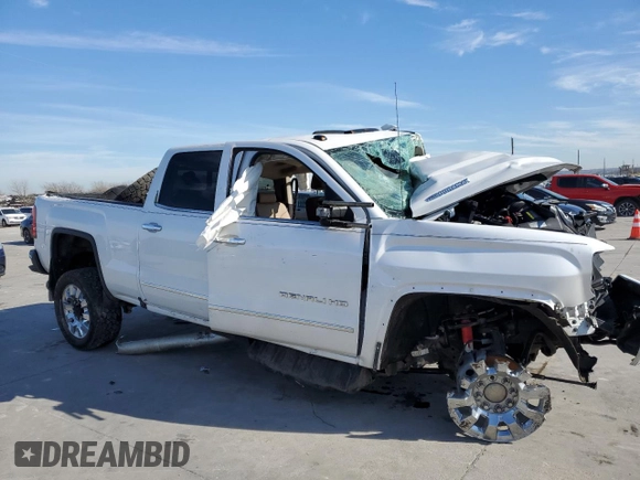 2018 GMC Sierra 2500HD Denali z VIN 1GT12UEYXJF225397, wystawiony jako Copart lot #87736565 z przebiegiem Nie podano mil oraz Nie do naprawy • Non repairable. Historia ofert i sprzedaży dostępna na DreamBid. Obrazek 4.