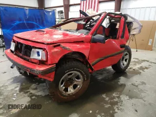 1992 Geo Tracker z VIN 2CNBJ18U1N6917736, wystawiony jako Copart lot #76609574 z przebiegiem Nie podano mil oraz Szkody całkowita. Historia ofert i sprzedaży dostępna na DreamBid. Obrazek 1.