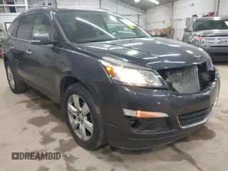2016 Chevrolet Traverse LT z VIN 1GNKVGKDXGJ207316, wystawiony jako IAAI lot #42419785 z przebiegiem 224 491 mil mil oraz . Historia ofert i sprzedaży dostępna na DreamBid. Obrazek 1.