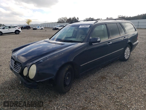 2001 Mercedes-Benz E-Class with VIN WDBJH65JX1B387291, listed as a Copart auction lot 79756824 with 261,205 mi miles and Salvage Title. Bid and sale history available at carsss.com. Image 1.