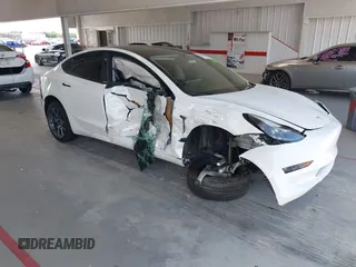 2023 Tesla Model 3 z VIN 5YJ3E1EAXPF606178, wystawiony jako IAAI lot #42543528 z przebiegiem 26 638 mil mil oraz . Historia ofert i sprzedaży dostępna na DreamBid. Obrazek 1.