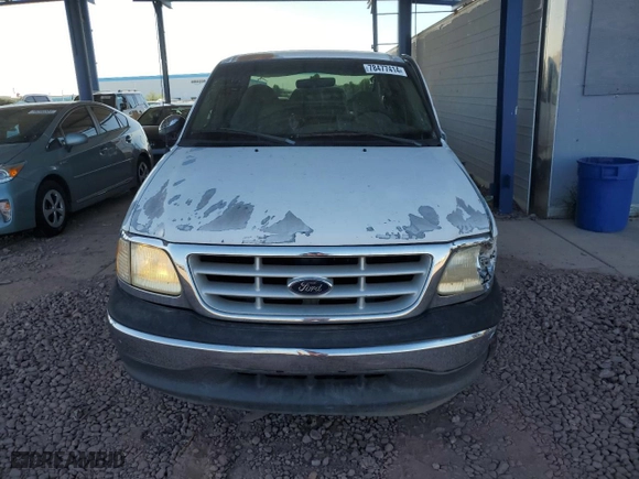 1999 Ford F-250 Work Series with VIN 1FTRX27L4XKA94798, listed as a Copart auction lot 78477414 with NaN miles and Salvage Title. Bid and sale history available at carsss.com. Image 5.